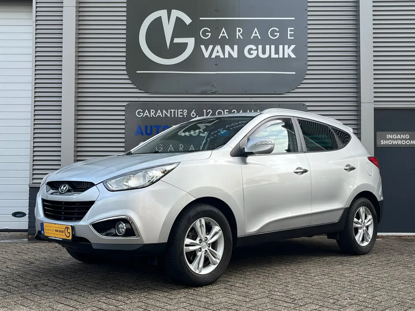 Hyundai iX35 2.0i Style 163PK Trekhaak,Navi,Clima,Cruise,Isofix Gris - 1