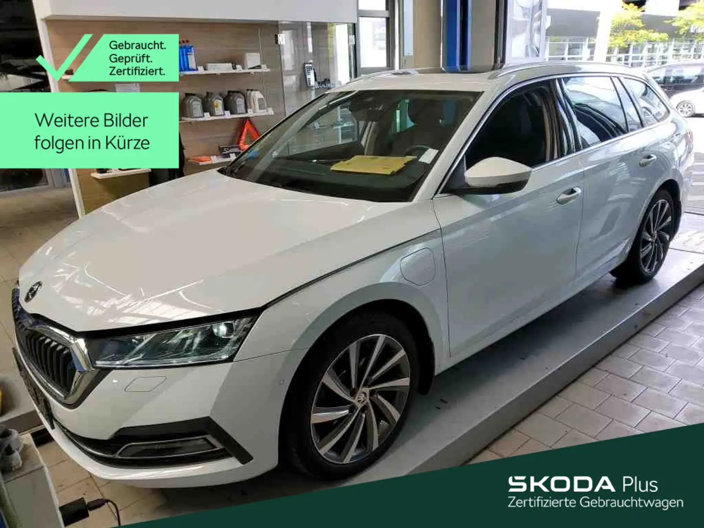 Skoda Octavia iV Combi Style 1.4TSI *NAVI*PANO*KAM*HUD Wit - 1