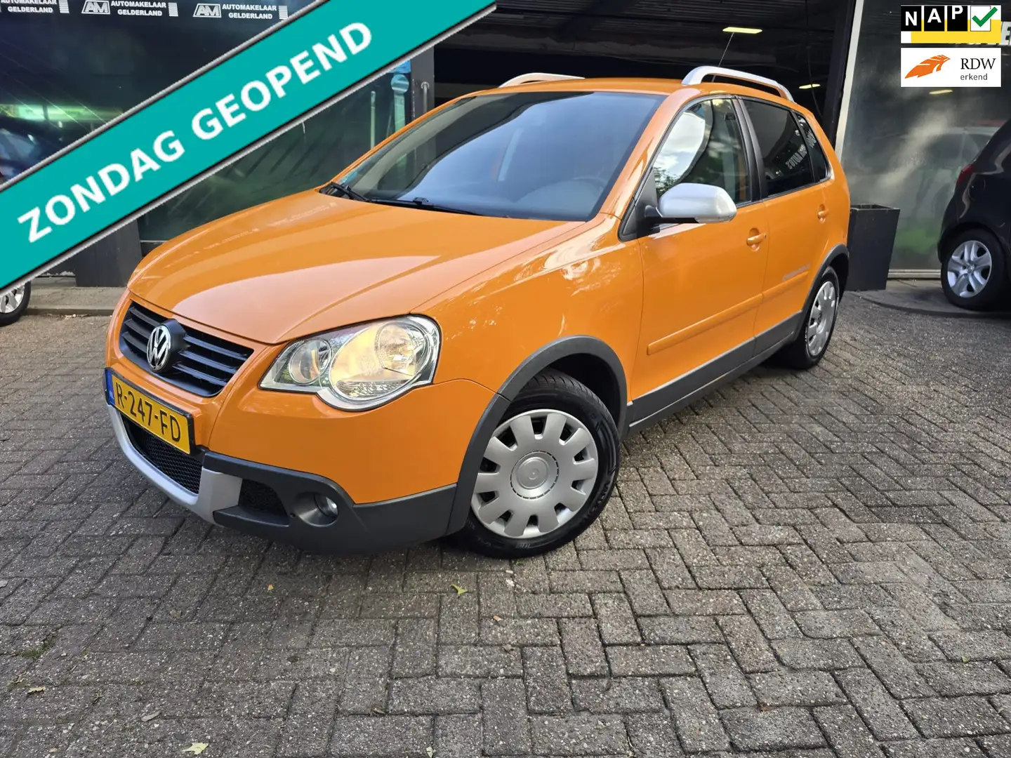 Volkswagen Polo Cross 1.2-12V | 12MND GARANTIE | NIEUWE APK | AIRCO | CR Naranja - 1
