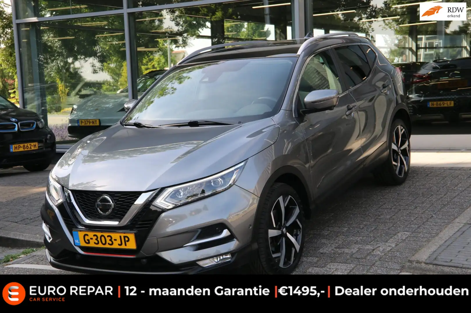 Nissan Qashqai 1.3 DIG-T Tekna DEALER OND. TREKHAAK NL-AUTO! Grijs - 1