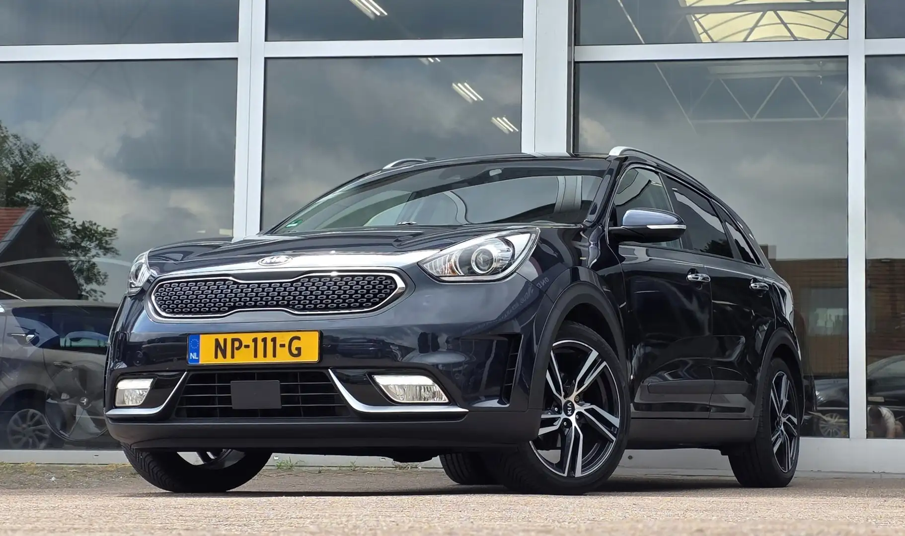 Kia Niro 1.6 GDi Hybrid ExecutiveLine 3e eigenaar Leer Xeno Blauw - 1