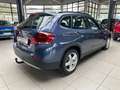 BMW X1 18 i sDrive Tuner*SHZ*AHK*PDC*Allwetter* Blauw - thumbnail 4
