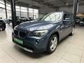 BMW X1 18 i sDrive Tuner*SHZ*AHK*PDC*Allwetter* Blauw - thumbnail 1