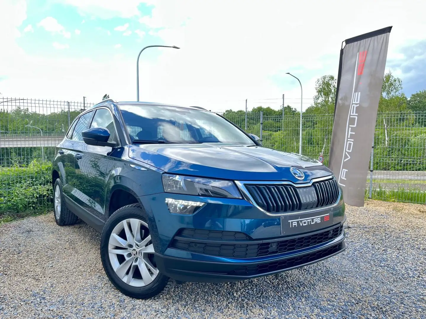 Skoda Karoq 1.0 TSI Ambition NAV/CARPLAY/SIEGES-CHAUF/HAYON-EL Blauw - 1
