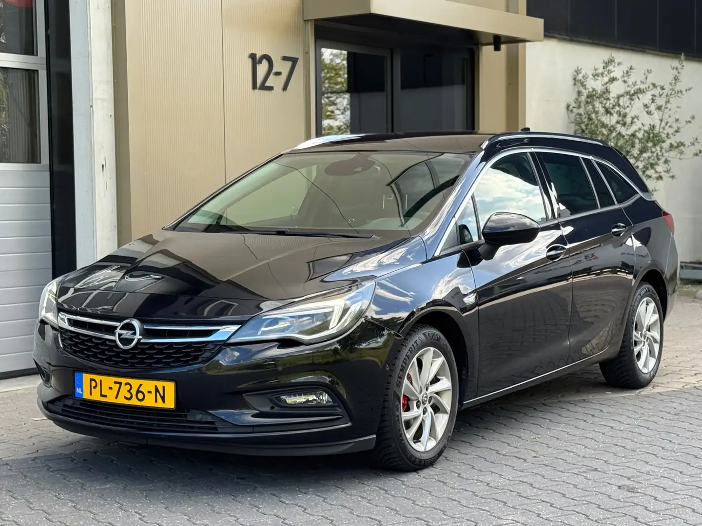 Opel Astra Sports Tourer 1.4|Innovation|camera|carplay| Zwart - 1