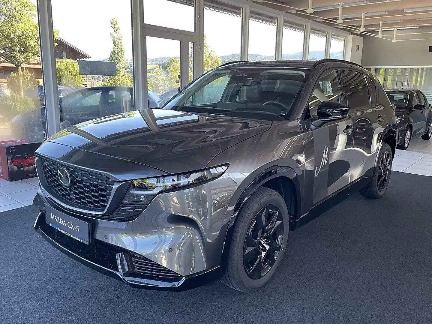 Mazda CX-5 e-Skyactiv G141 MHEV AWD Homura Aut. Grau - 1