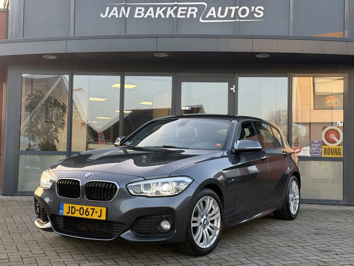 BMW 118 1-serie 118i M Sport ✅ NaviPro ✅ LED ✅ Clima ✅ Afn Grau - 1
