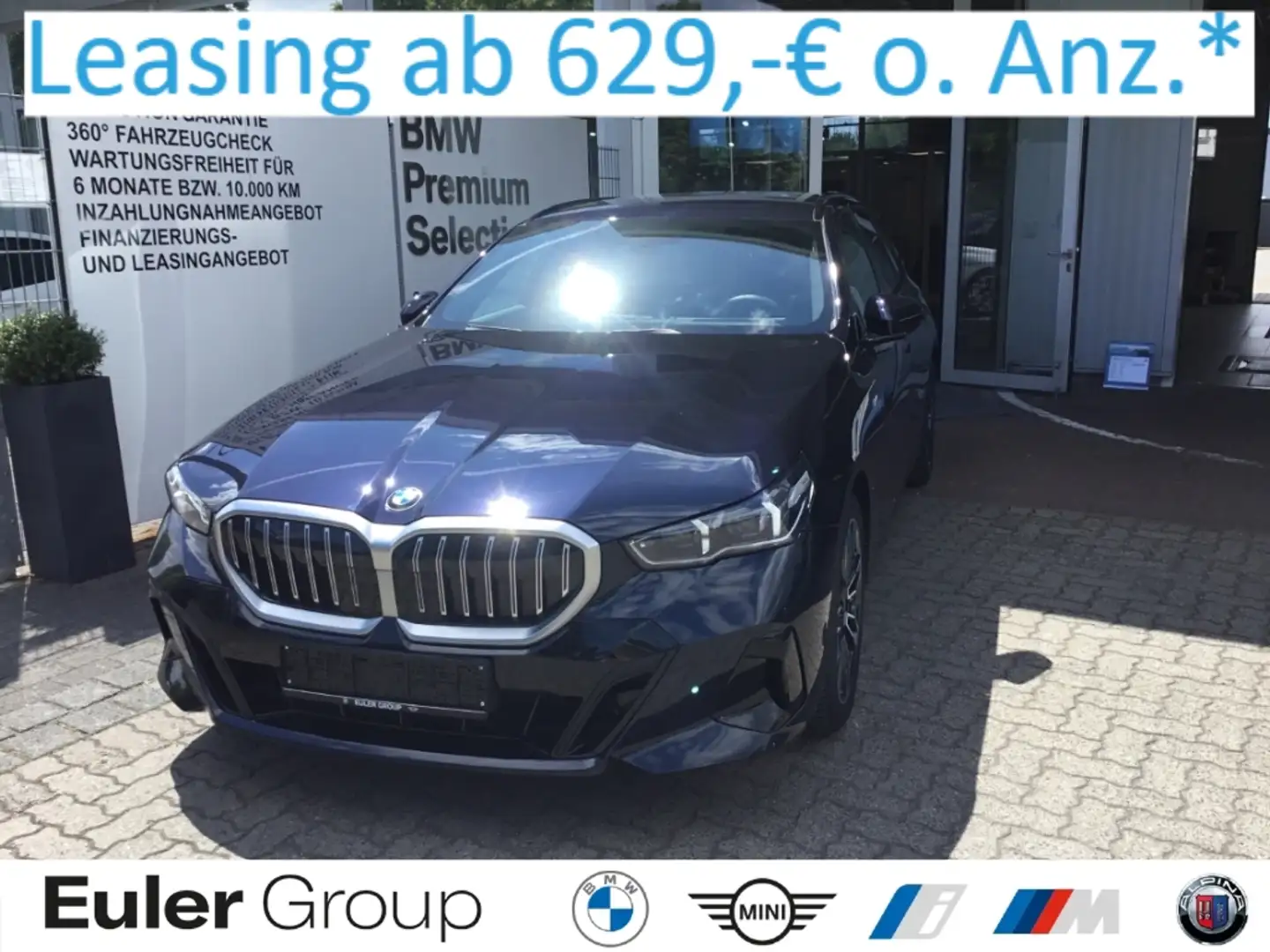 BMW 520 d Touring M Sport StandHZG AHK H/K Travel+Comf. PA Schwarz - 1