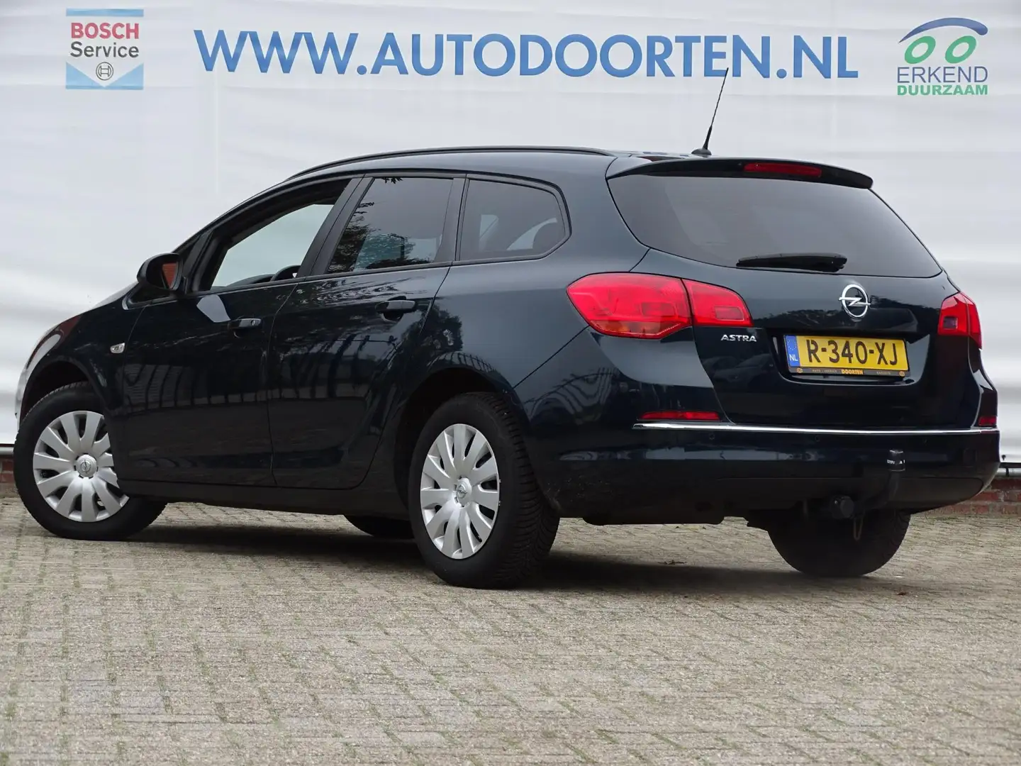 Opel Astra SPORTS TOURER 1.4 Turbo Sport + TREKHAAK|AIRCO|NAV Groen - 2