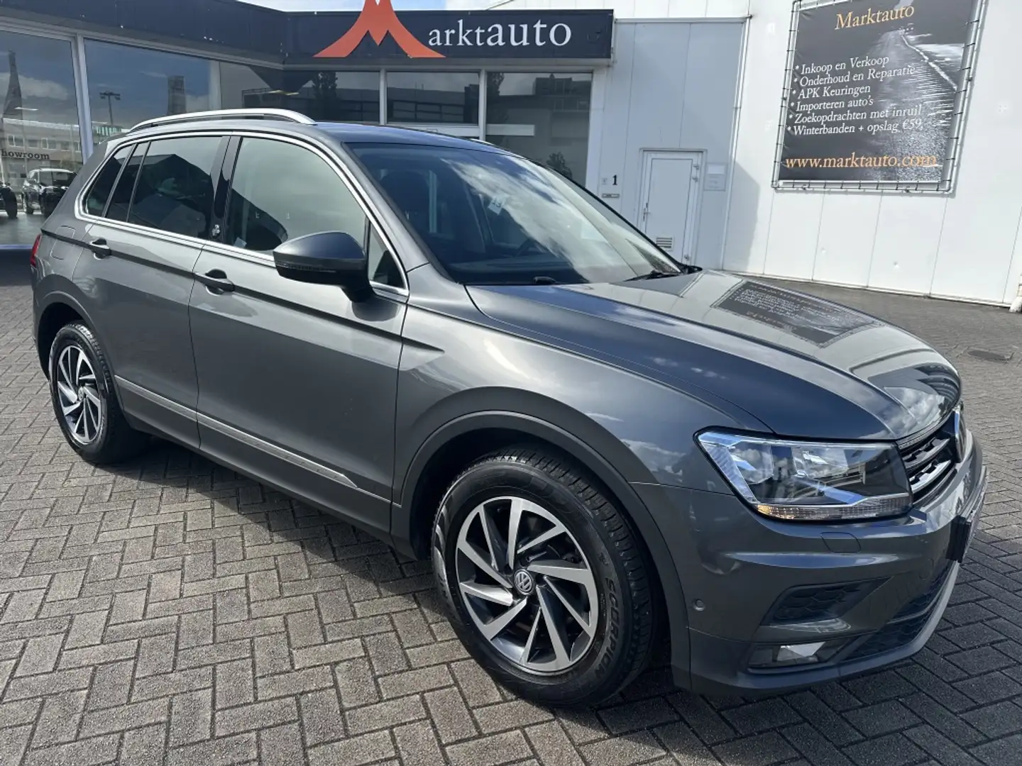 Volkswagen Tiguan 1.4 TSI Sound Navi Carplay Adaptive Cruise Stoelve Grijs - 1