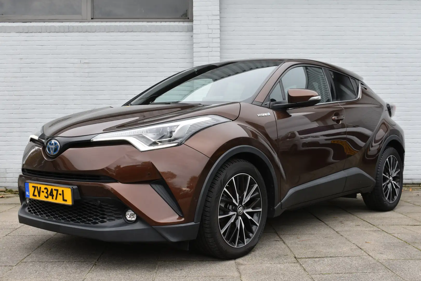 Toyota C-HR 1.8 Hybrid Executive Ultimate Automaat 122pk | Dod Bruin - 1