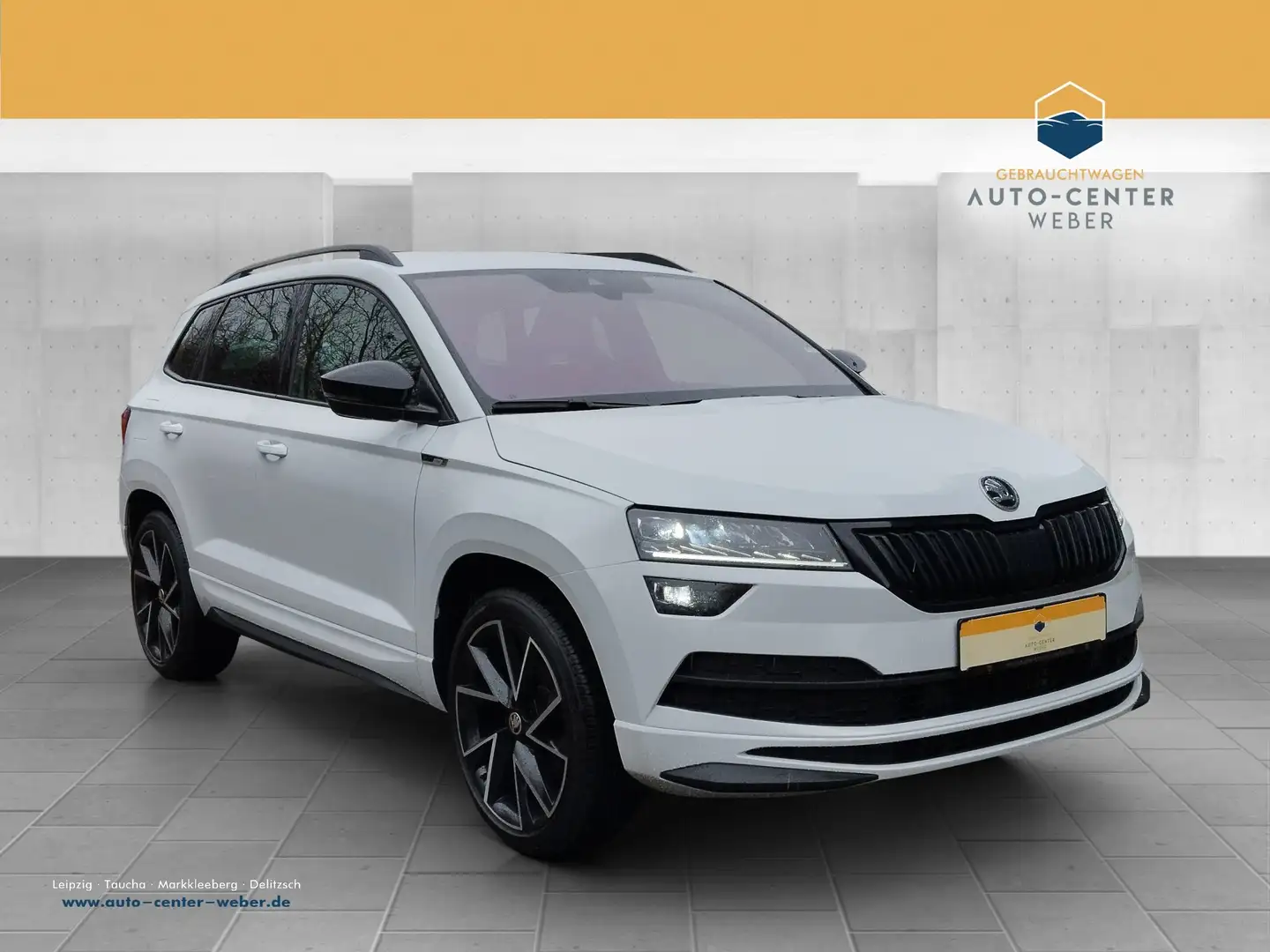 Skoda Karoq 2.0 TSI Sportline 4x4 DSG 4xSHZ*ACC*AHK*LM Weiß - 1