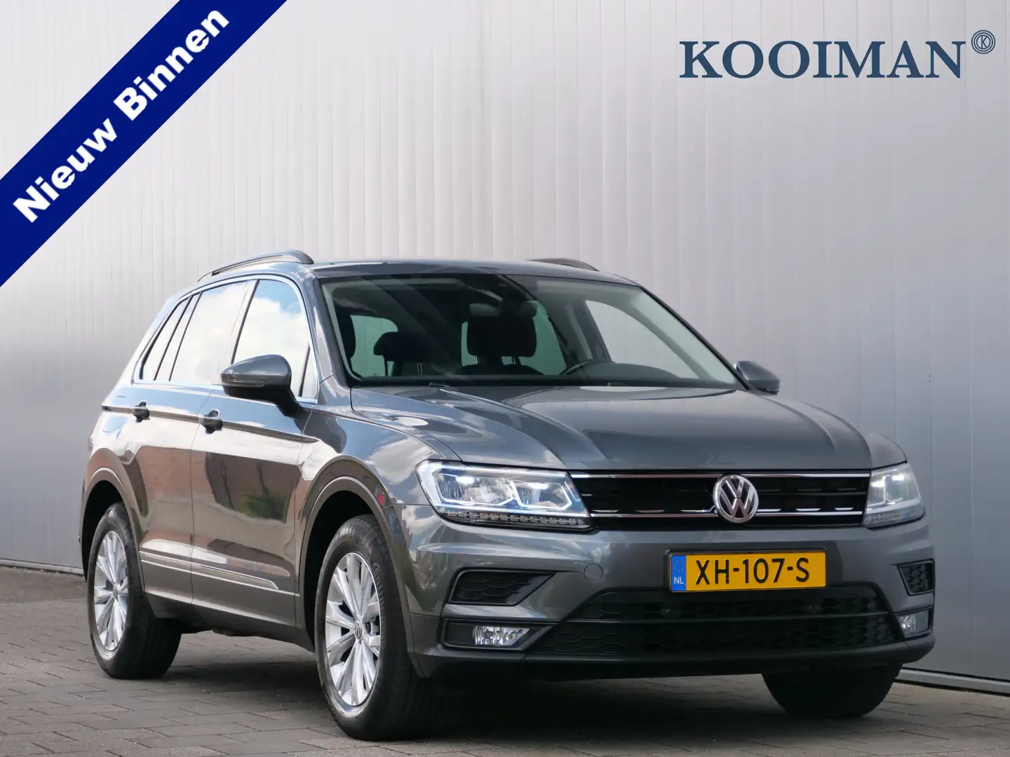 Volkswagen Tiguan 1.5 TSI Comfortline 131 Pk Navigatie / PDC / Trekh Grijs - 1