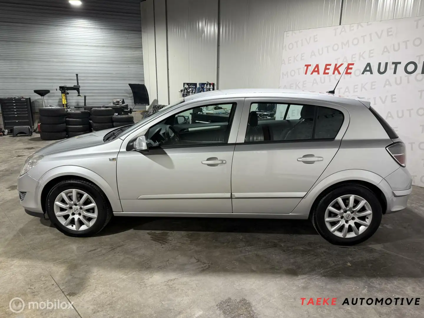 Opel Astra 1.6 Temptation Airco/Cruise/2e EIG/Nap Grijs - 2