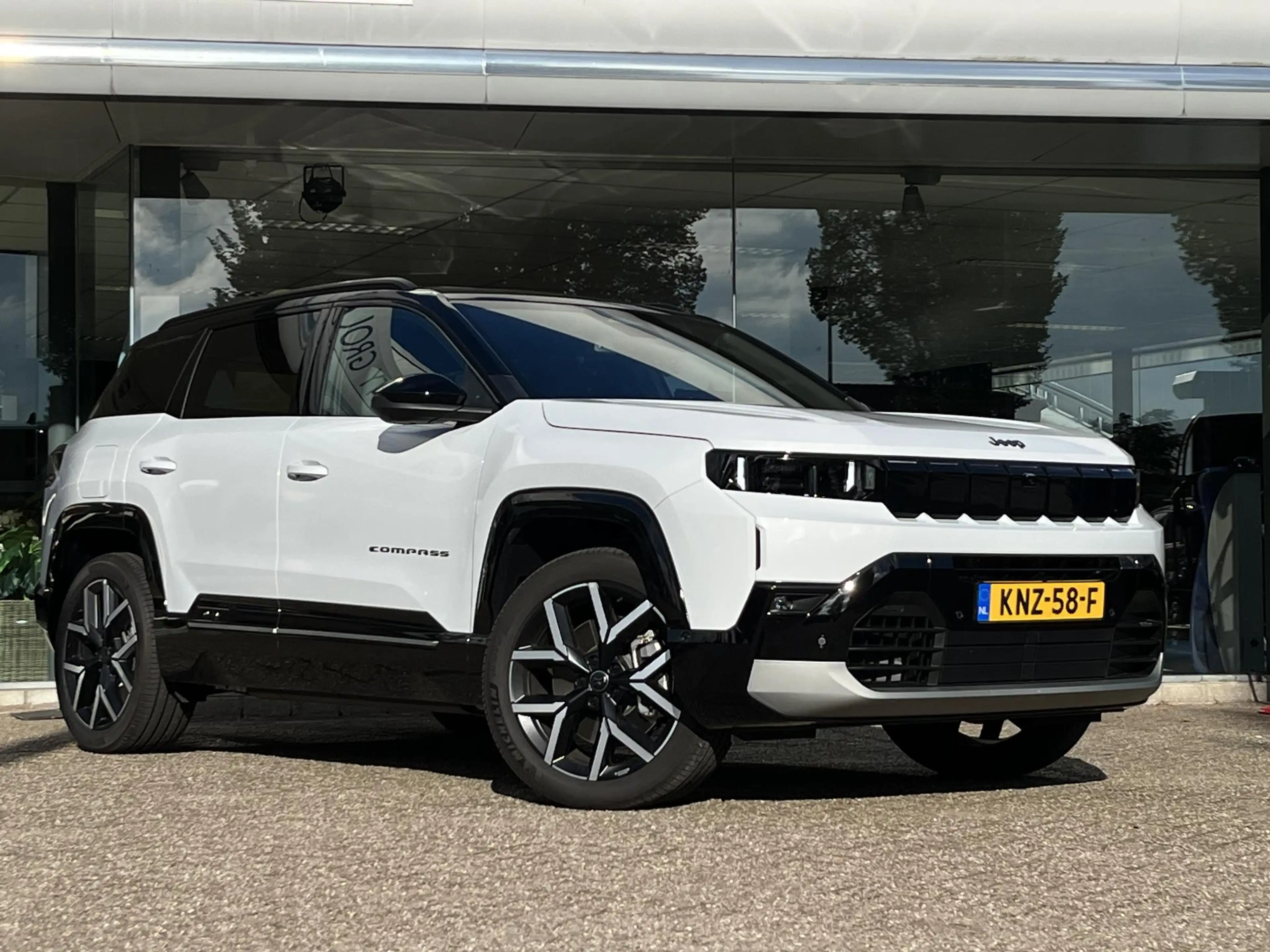Jeep Compass 1.6 e-Hybrid Plug-In First Edition | Schuif-kantel — photo 5