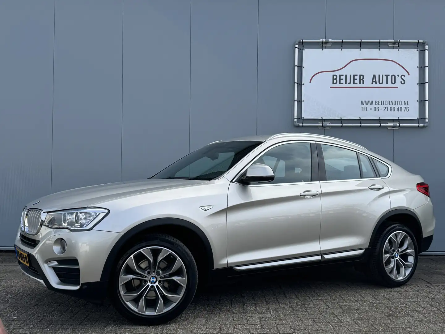 BMW X4 xDrive20i High Executive xLine Edition Automaat Grijs - 1