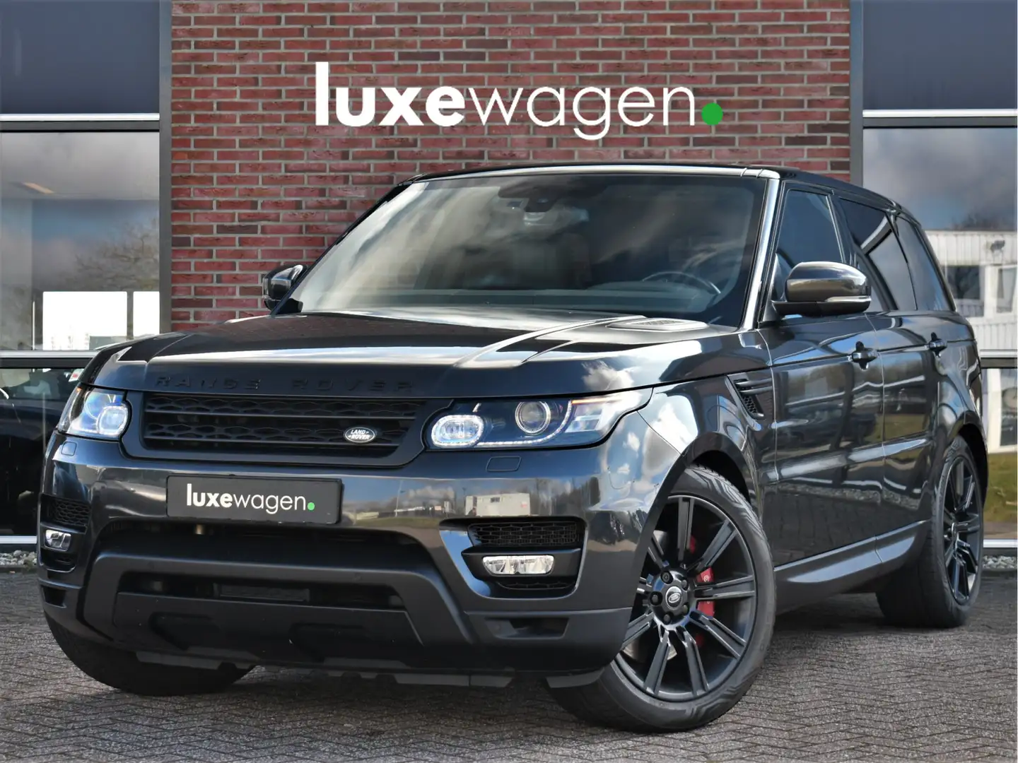 Land Rover Range Rover Sport 5.0 V8 Supercharged HSE Pano Sportuitlaat Meridian Grijs - 1