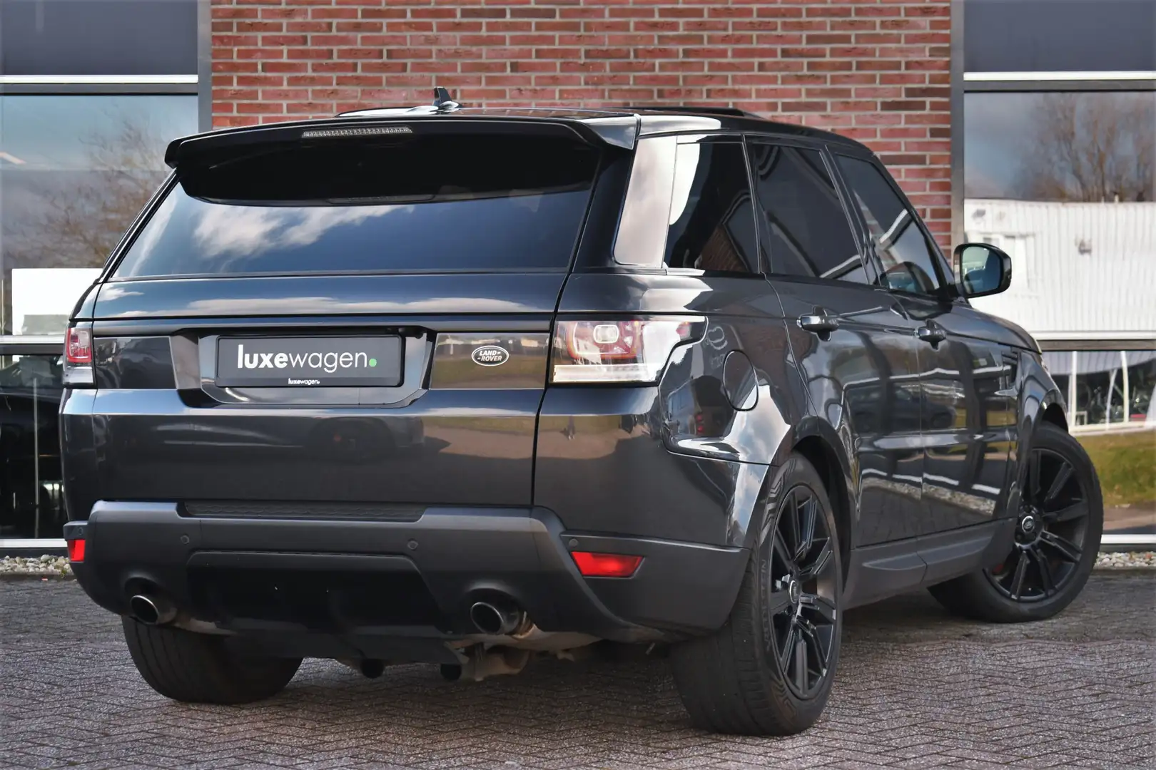 Land Rover Range Rover Sport 5.0 V8 Supercharged HSE Pano Sportuitlaat Meridian Grijs - 2