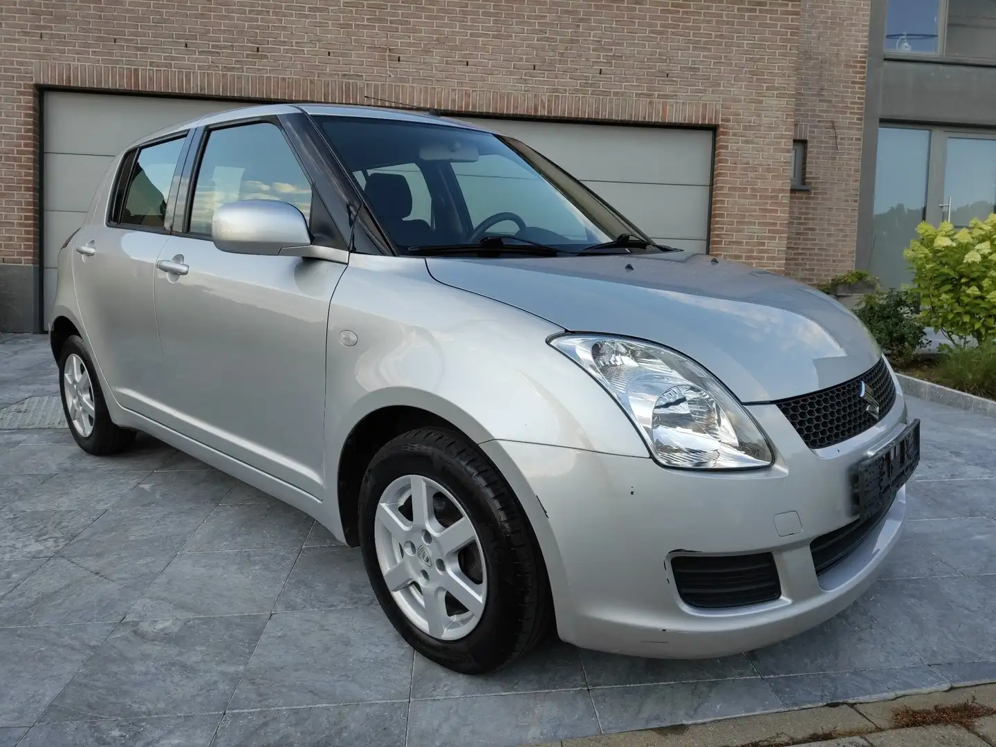 Suzuki Swift 1.3i  confort - 1