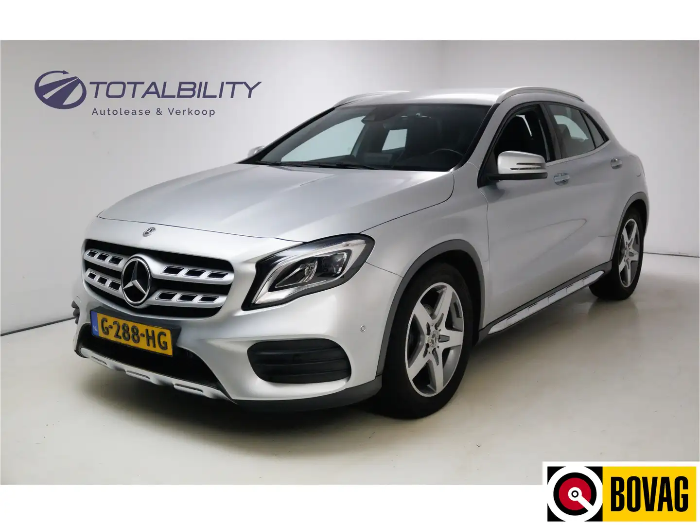 Mercedes-Benz GLA 180 Buss.Sol. AMG Automaat | Trekhaak | Led | Stoelver Grijs - 1