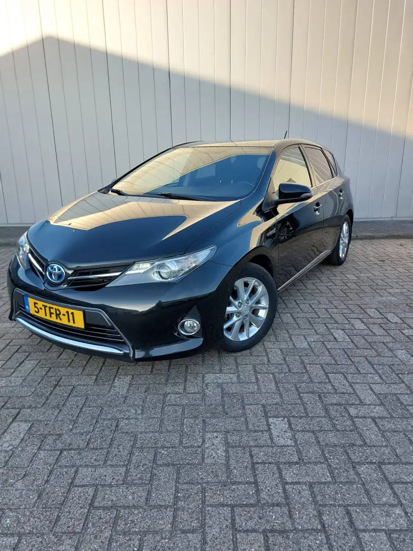 Toyota Auris 1.8 Hybrid Lease Clima Cruise Navi Camera PDC Zwart - 1