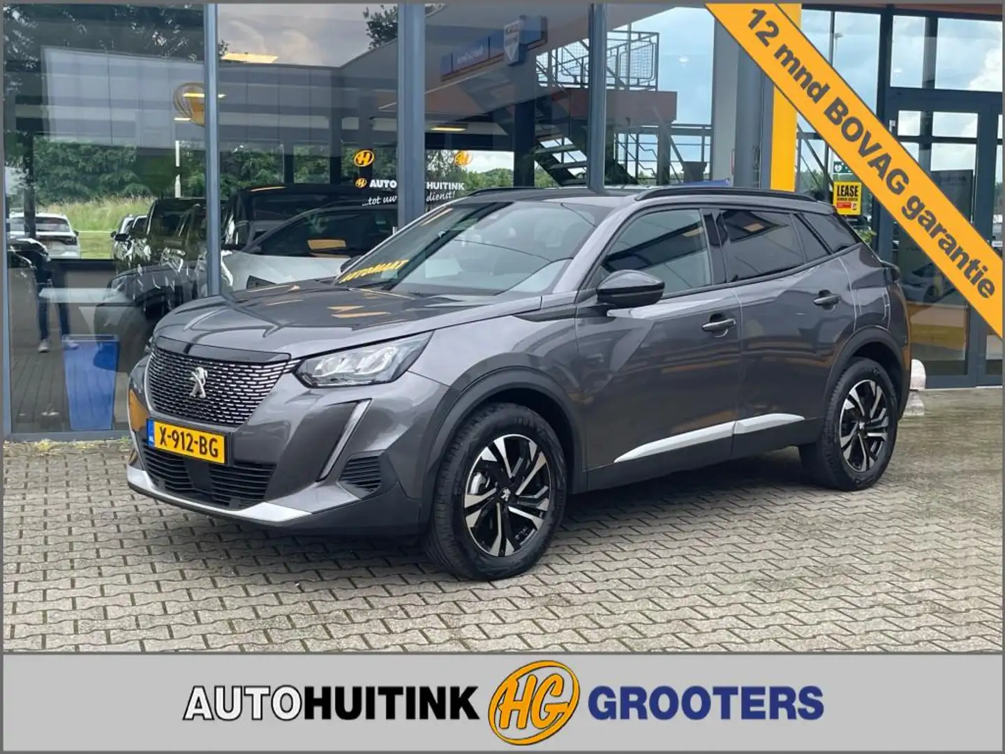 Peugeot 2008 1.2 Pure Tech Allure 130pk - LED - Navi Gris - 1