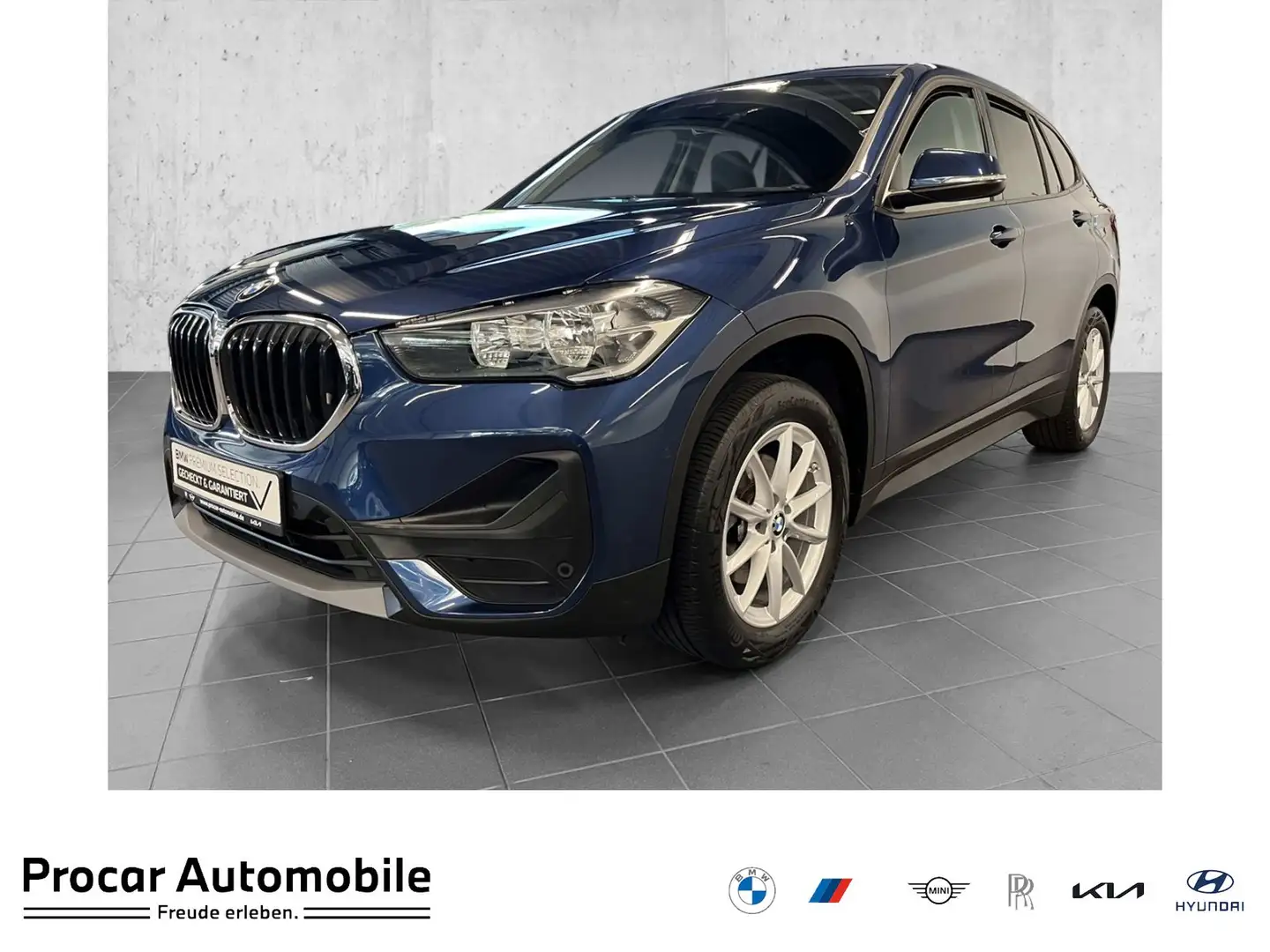 BMW X1 sDrive18i RFK NAVI PDC V+H DAB Parkass. LM Blauw - 1