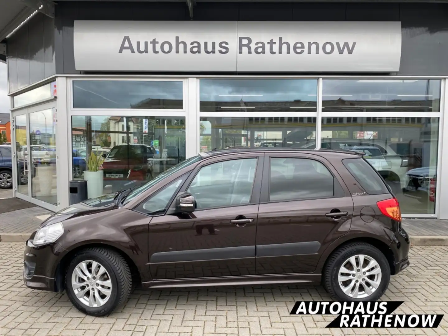 Suzuki SX4 City+ 1.6 Navi Klimaautom SHZ Keyless Entry Keyles Brun - 1
