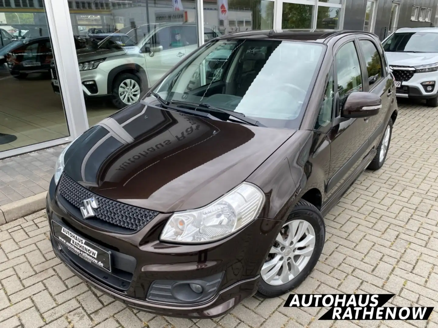 Suzuki SX4 City+ 1.6 Navi Klimaautom SHZ Keyless Entry Keyles Brun - 2
