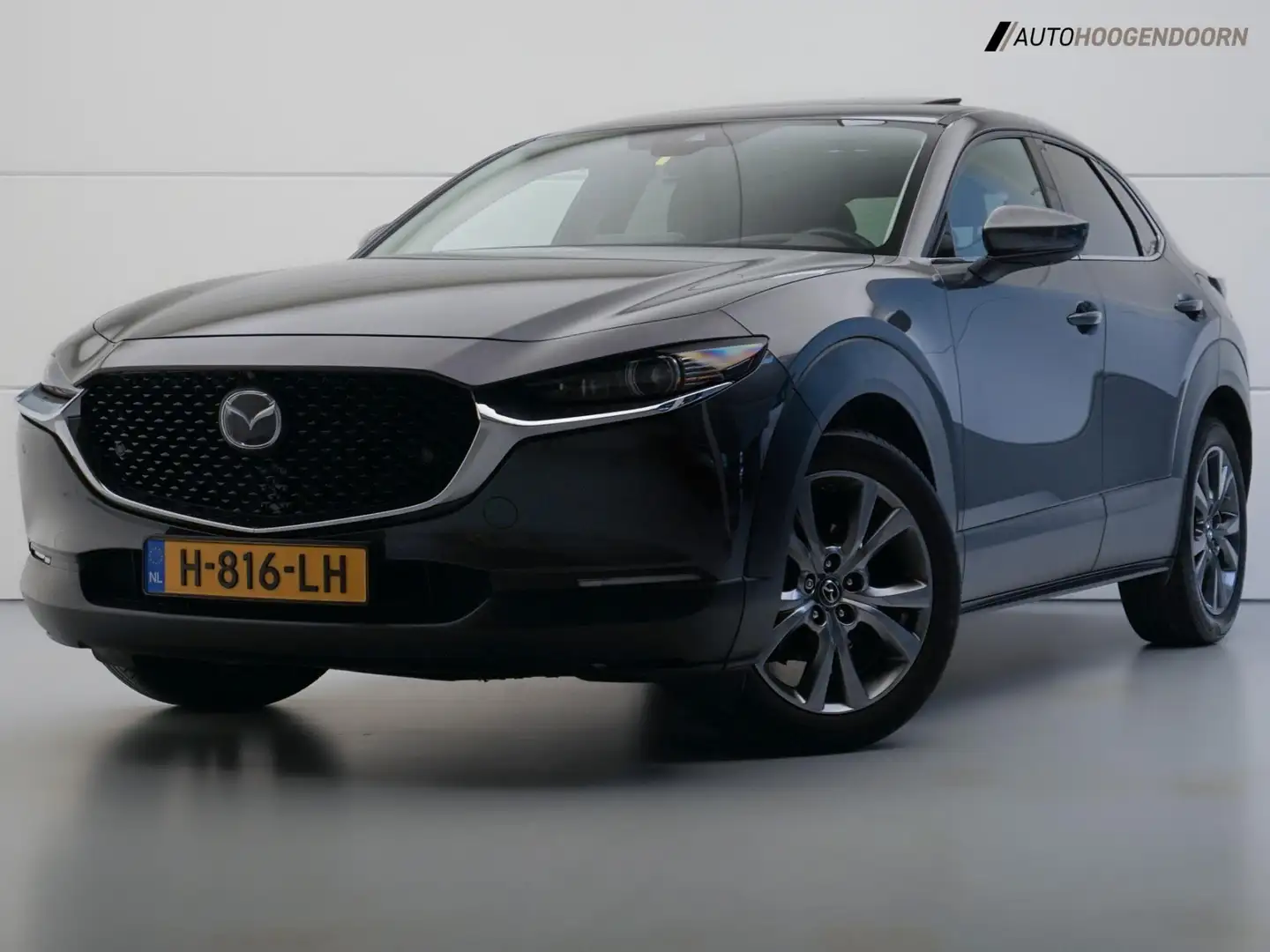 Mazda CX-30 2.0 e-SkyActiv-X M Hybrid Luxury (HEAD-UP DISPLAY, Grijs - 1