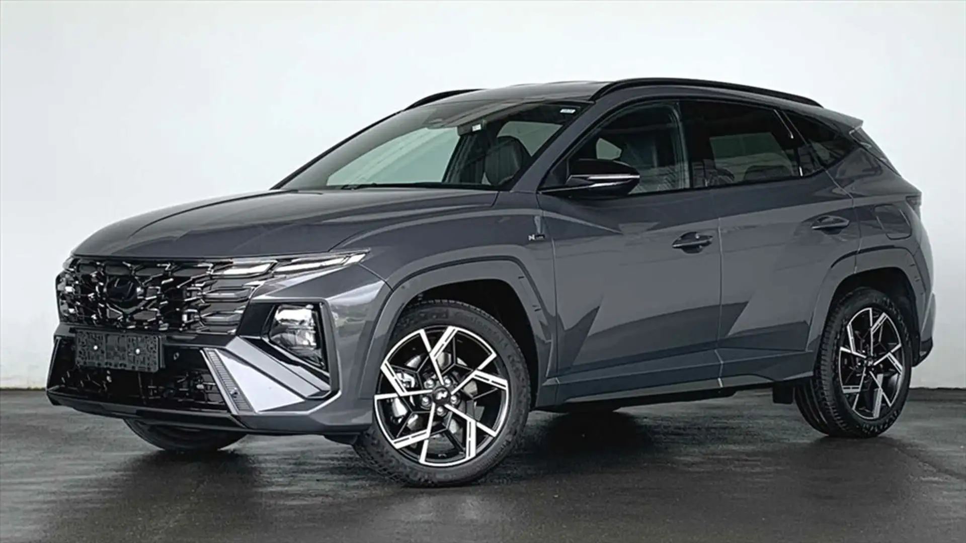 Hyundai TUCSON IV 1,6 T-GDi (MHEV) DCT 4WD N-Line ACC Grijs - 1