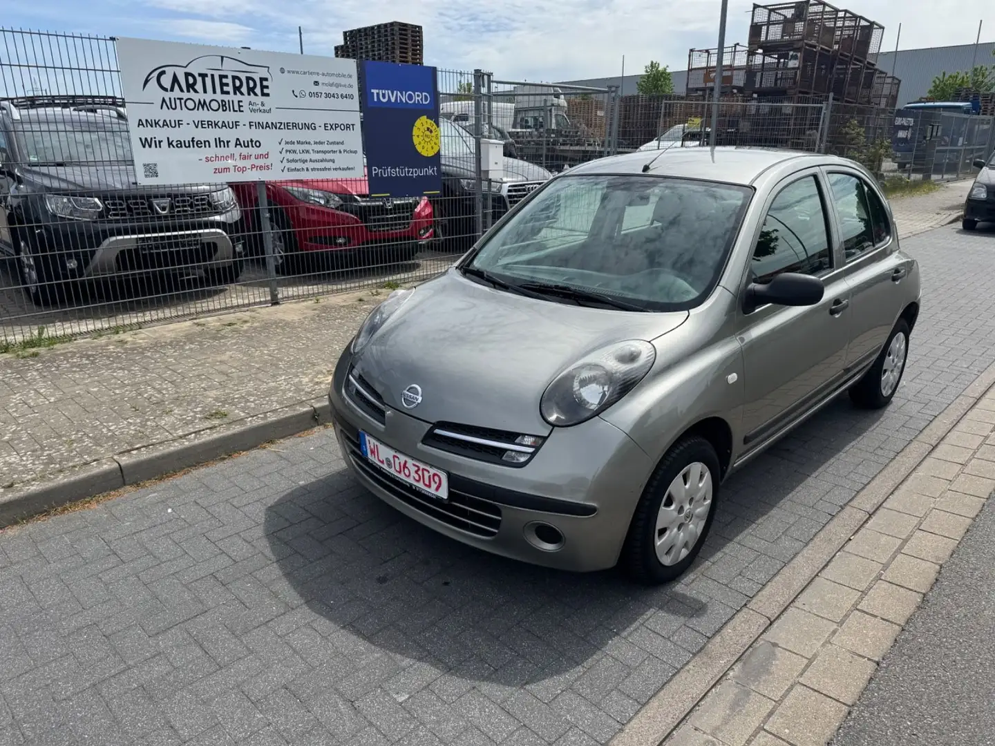 Nissan Micra City *KLIMAAUTO*TÜV-NEU*ELEKTR. Fenster* Silber - 1