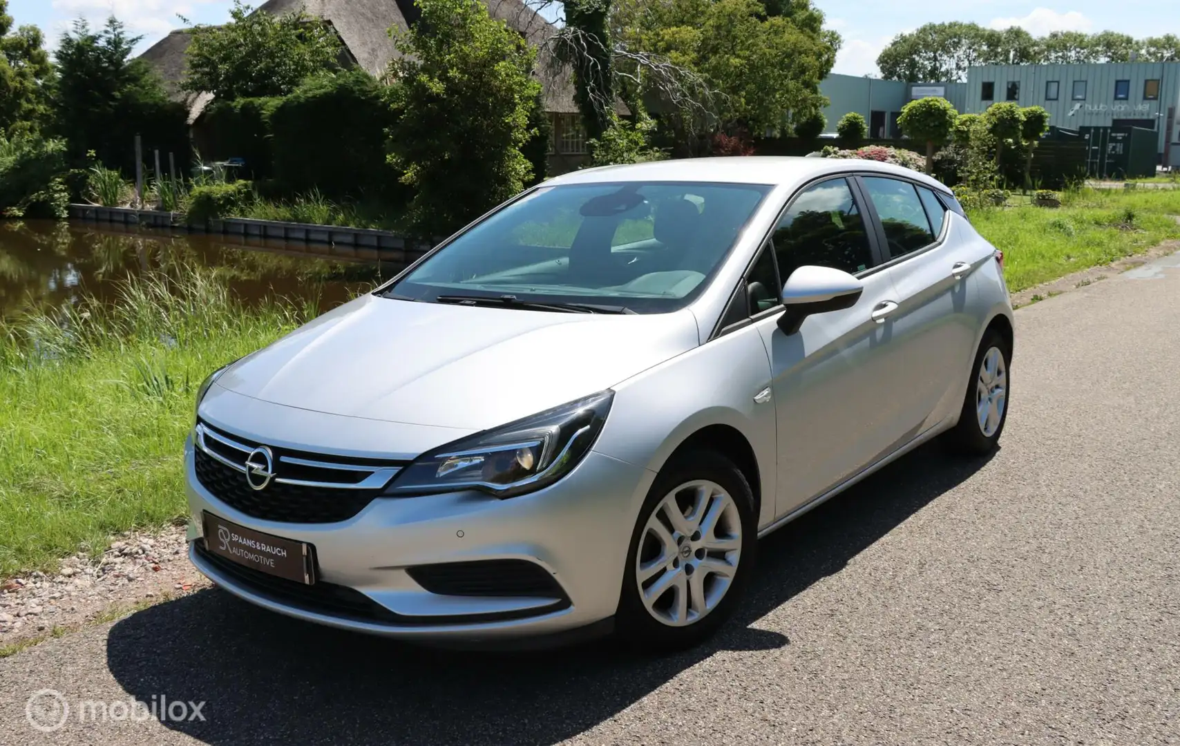 Opel Astra 1.0 Business+ / Navi / PDC / Trekhaak / Stoelverw Grijs - 1