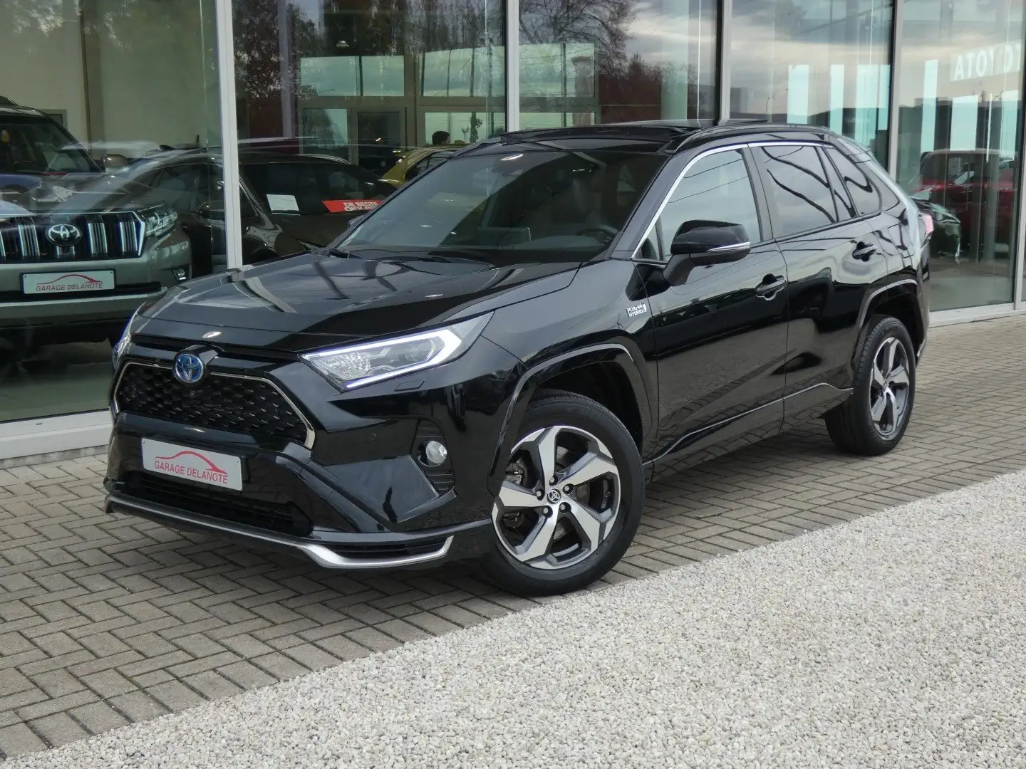 Toyota RAV 4 *PLUG-IN* AWD +PANO DAK +LEDER +JBL +HEAD UP DISPL Zwart - 1
