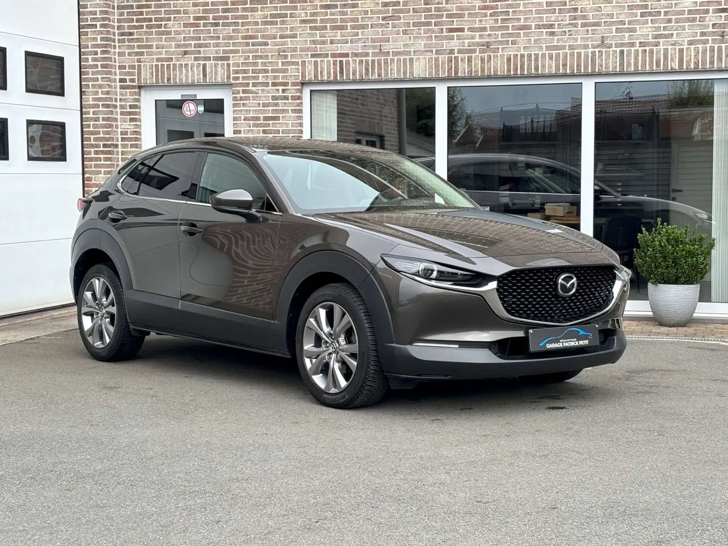Mazda CX-30 CX-30 2.0 M-HYBRID SKYCRUISE / Automaat / Trekhaak Bruin - 1