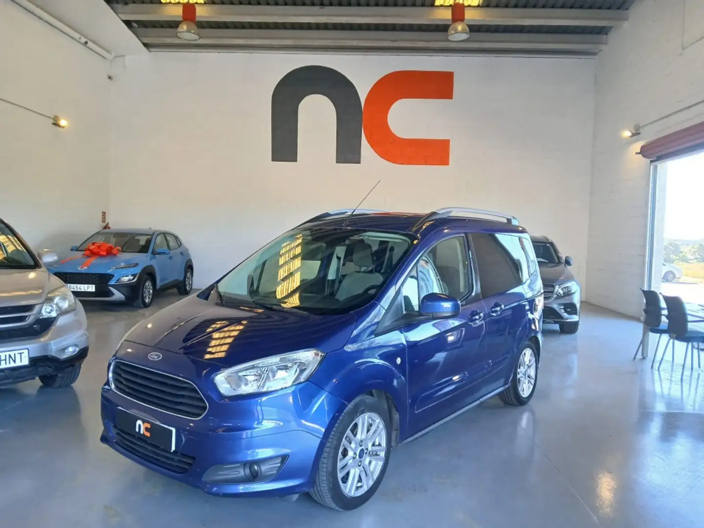 Ford Tourneo Courier 1.0 Ecoboost Titanium Blauw - 1