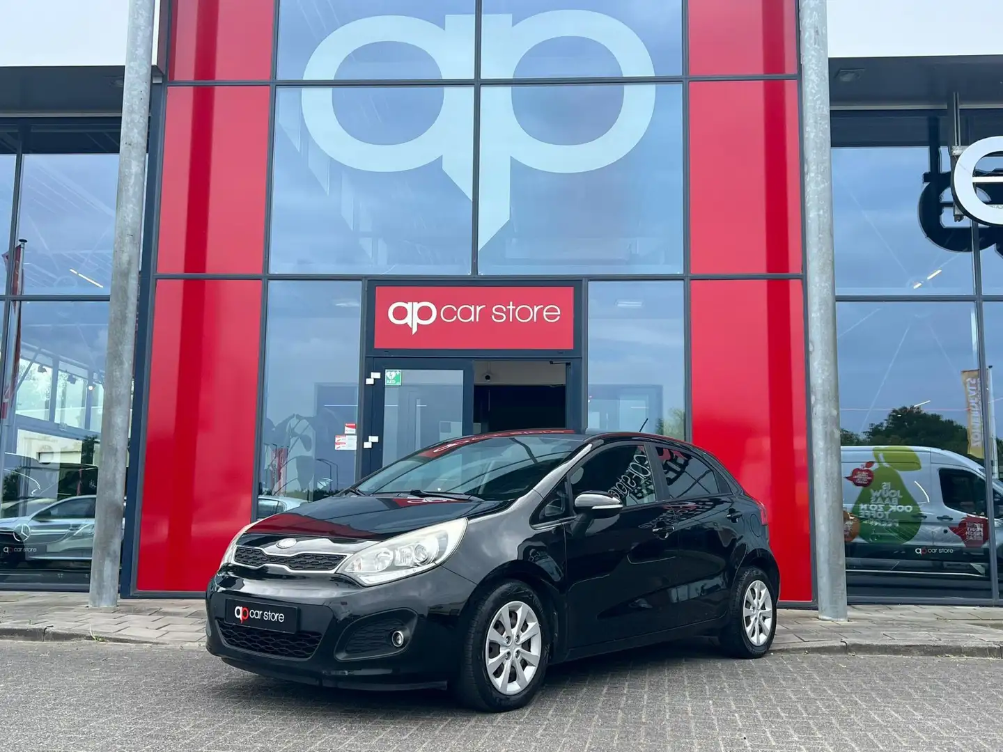 Kia Rio 1.2 CVVT Super Pack Zwart - 1