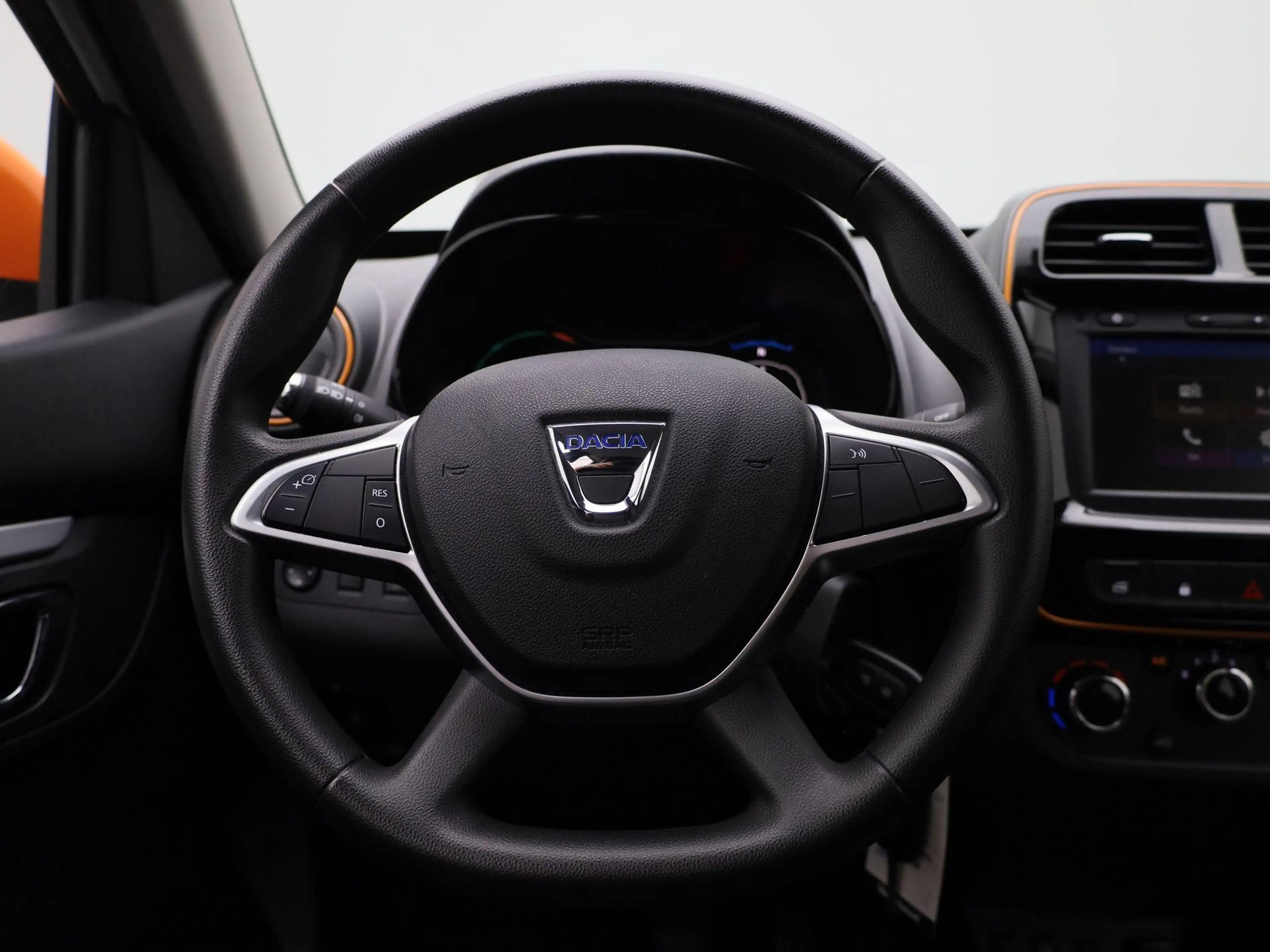 Dacia Spring Comfort Plus (Orange Pack) 27 kWh Navigatie | Appl — photo 7