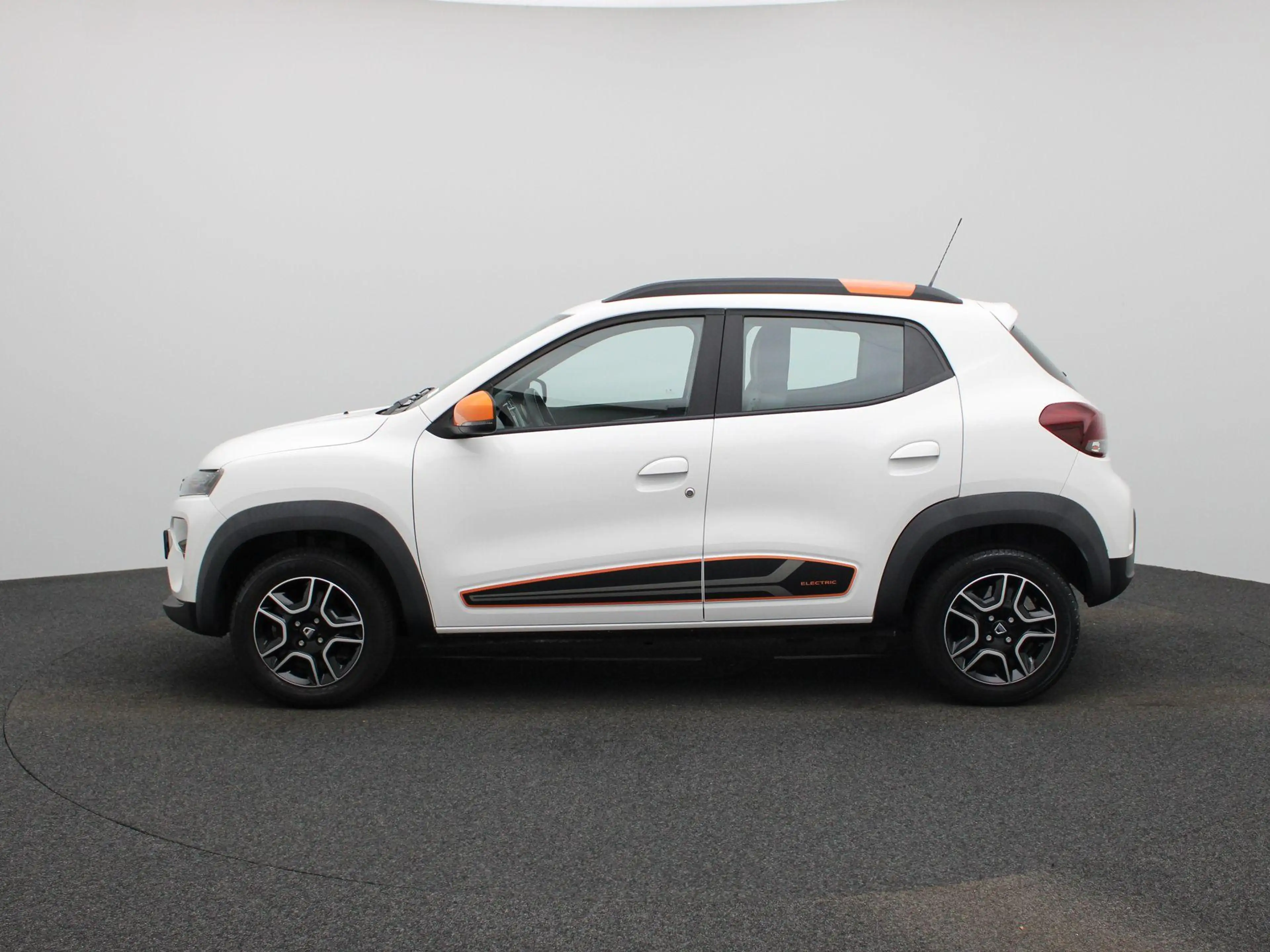 Dacia Spring Comfort Plus (Orange Pack) 27 kWh Navigatie | Appl — photo 4
