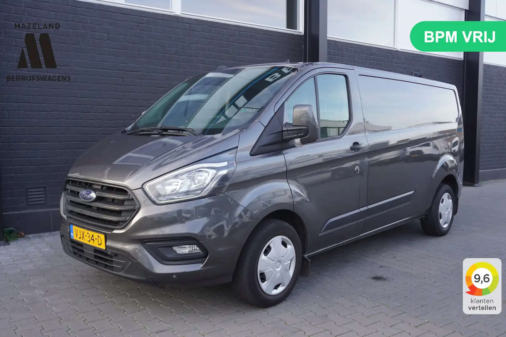 Ford Transit Custom 2.0 TDCI 130PK L2 EURO 6 - Airco - PDC - Cruise - Grijs - 1