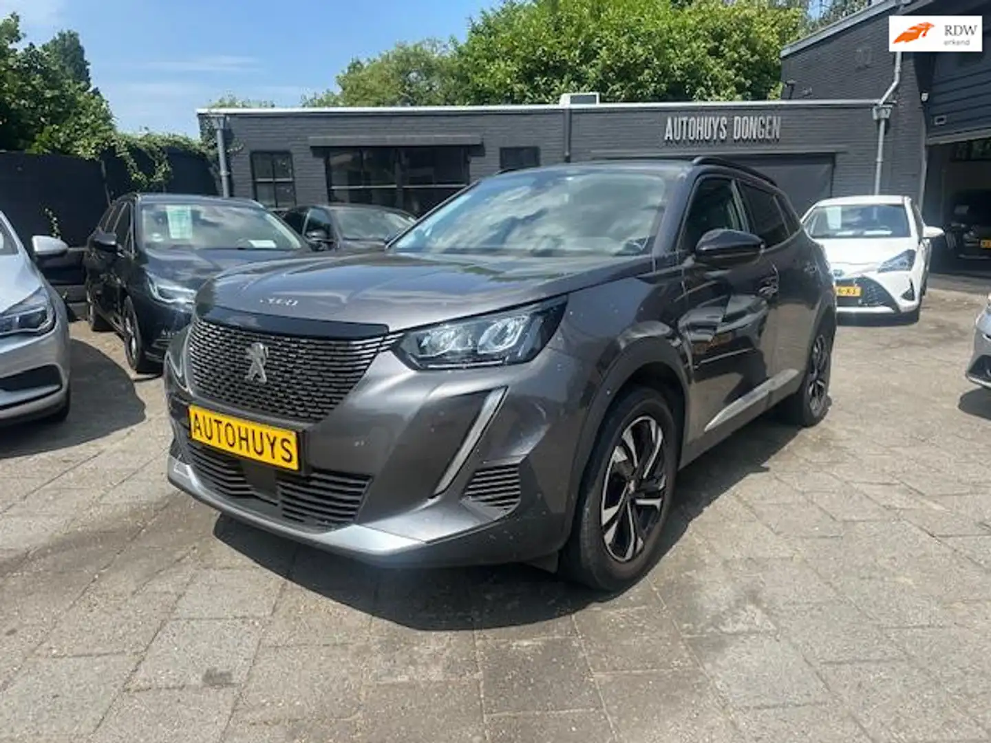 Peugeot 2008 1.2 PureTech (131pk) Allure! Aut! Apple/Android Ca Grijs - 1