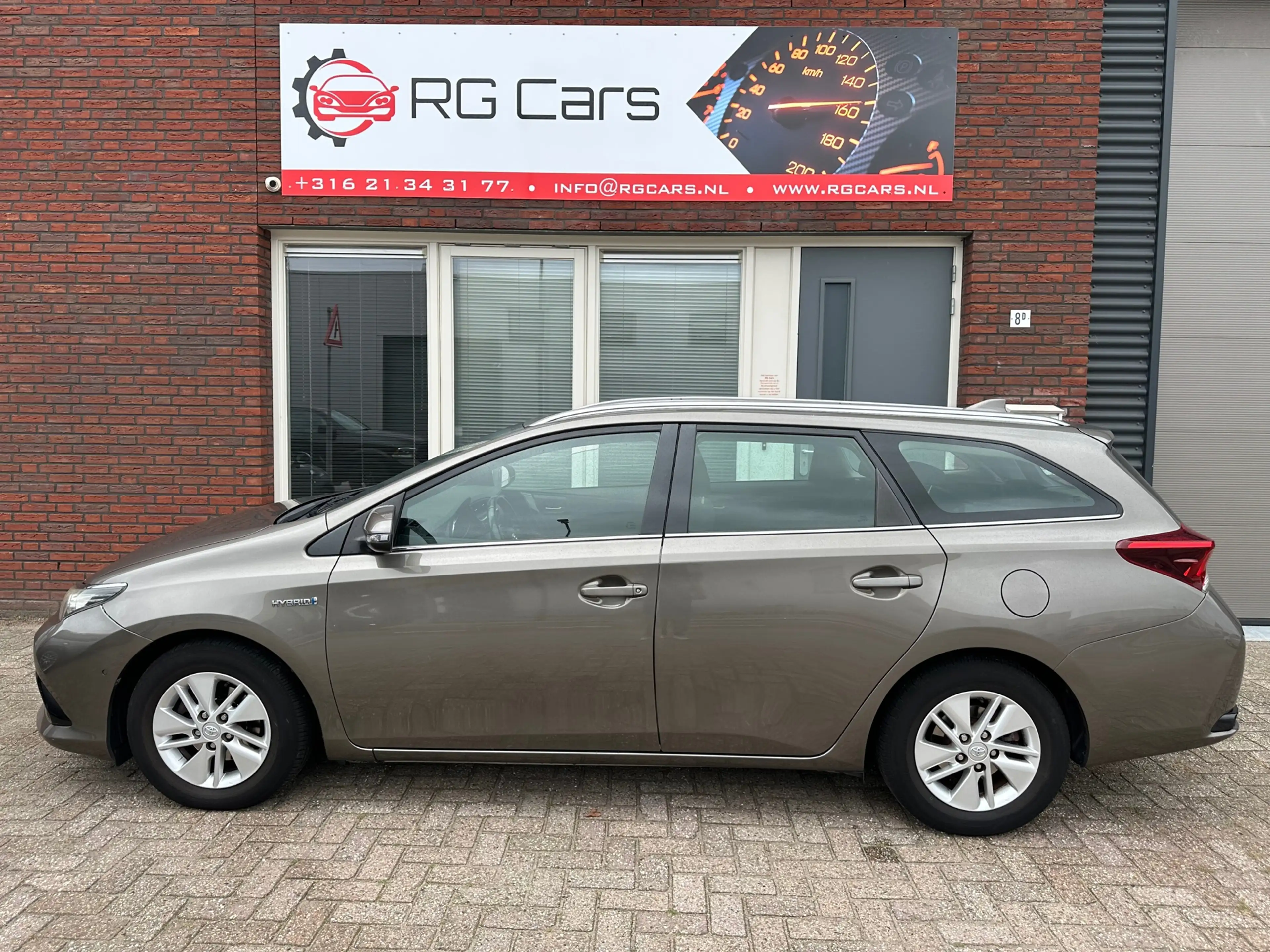 Toyota Auris Touring Sports 1.8 Hybrid Now / Camera / Navi / PD — photo 21