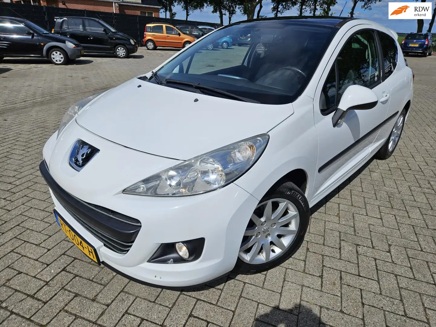 Peugeot 207 1.4 XR. 2010. Airco/Panorama/Spoiler/Lichtmetaal e Blanco - 1