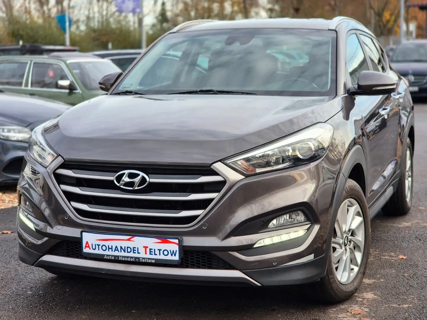 Hyundai TUCSON Intro Edition 4WD *AHK *Navi *Kamera *PDC Braun - 1