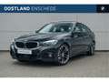 BMW 320 3 Serie Gran Turismo 320i High Executive M Sport A Zwart - thumbnail 1