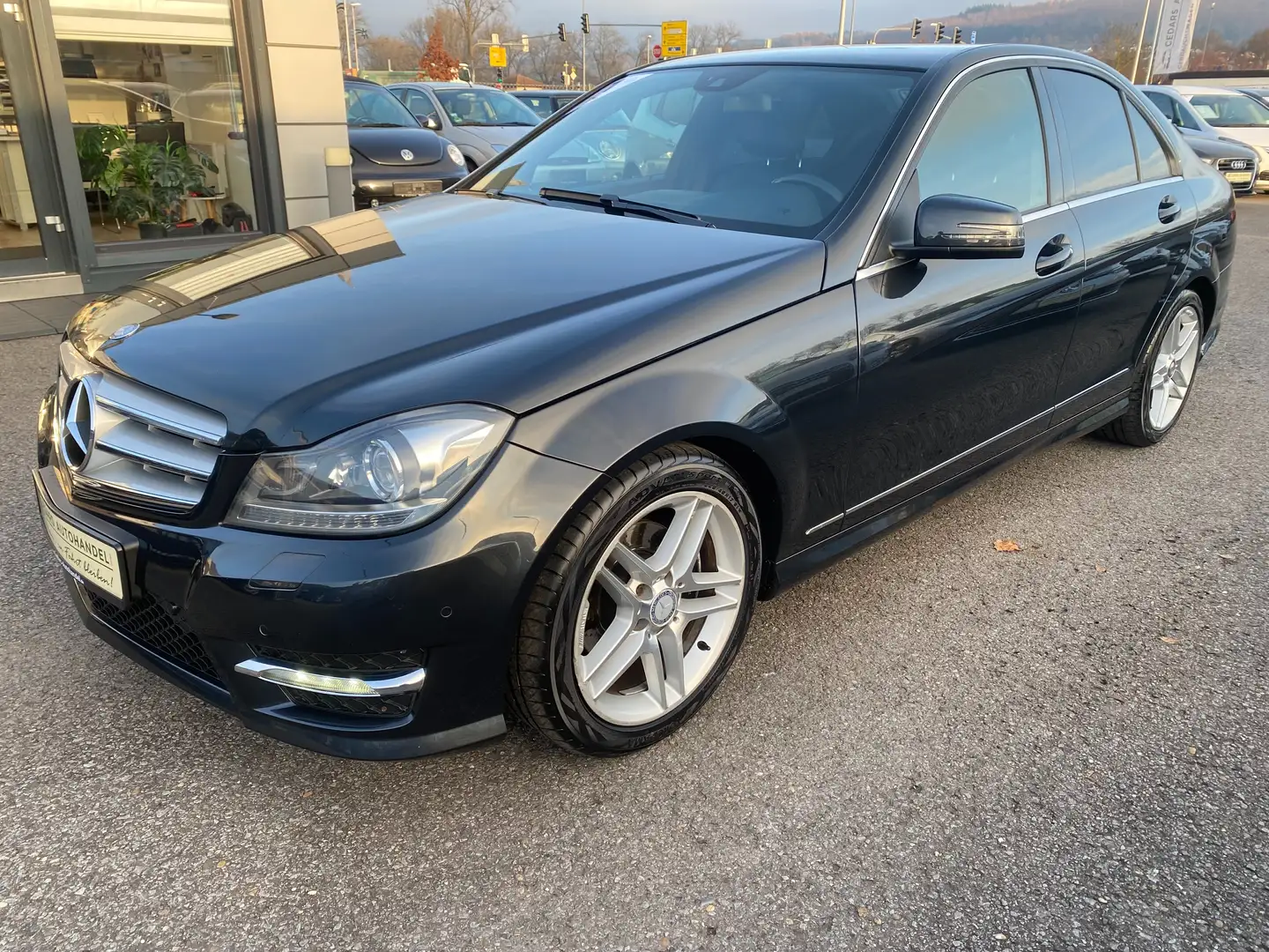 Mercedes-Benz C 180 CGI Lim. 7G-Tronic AMG 2.Hd Navi Xenon Sitzheizung Schwarz - 1