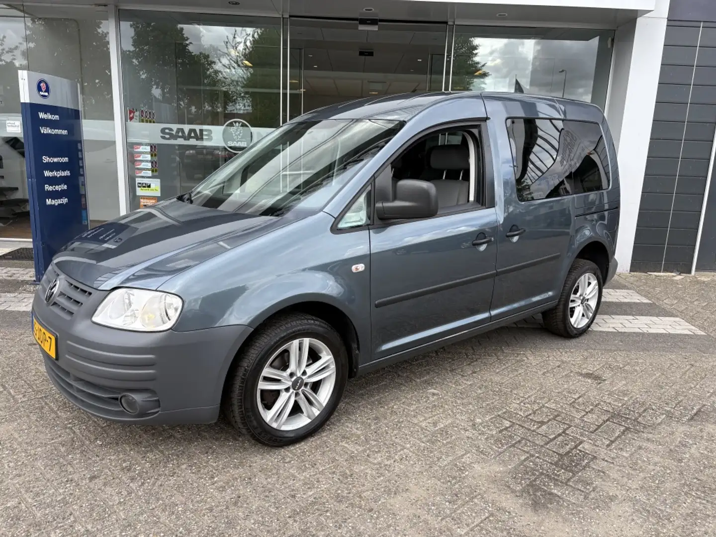 Volkswagen Caddy 1.6 Optive Comf. 5p. Grijs - 1