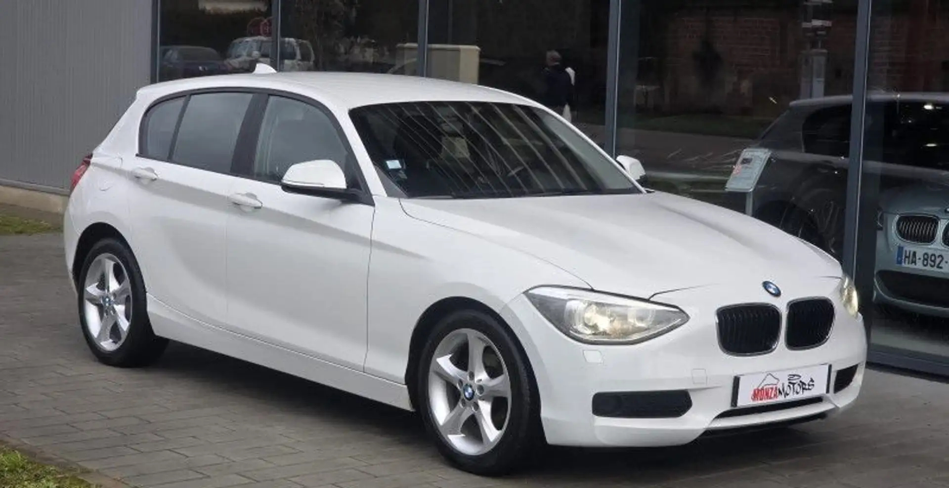 BMW 116 SERIE (F21-F20) 116I 136CH LOUNGE 5P Weiß - 1