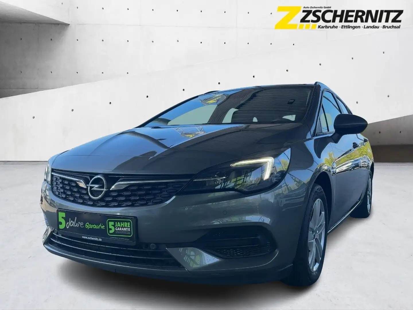 Opel Astra K ST 1.2 Turbo  Edition Klima Radio PDC Grijs - 1