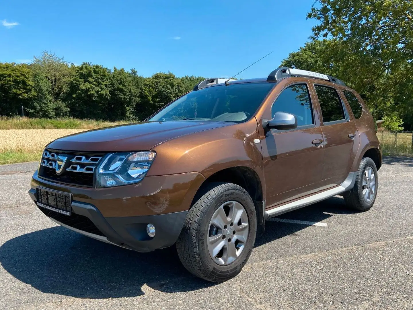 Dacia Duster I Prestige 4x2 Navi PDC Tempomat AHK Braun - 1